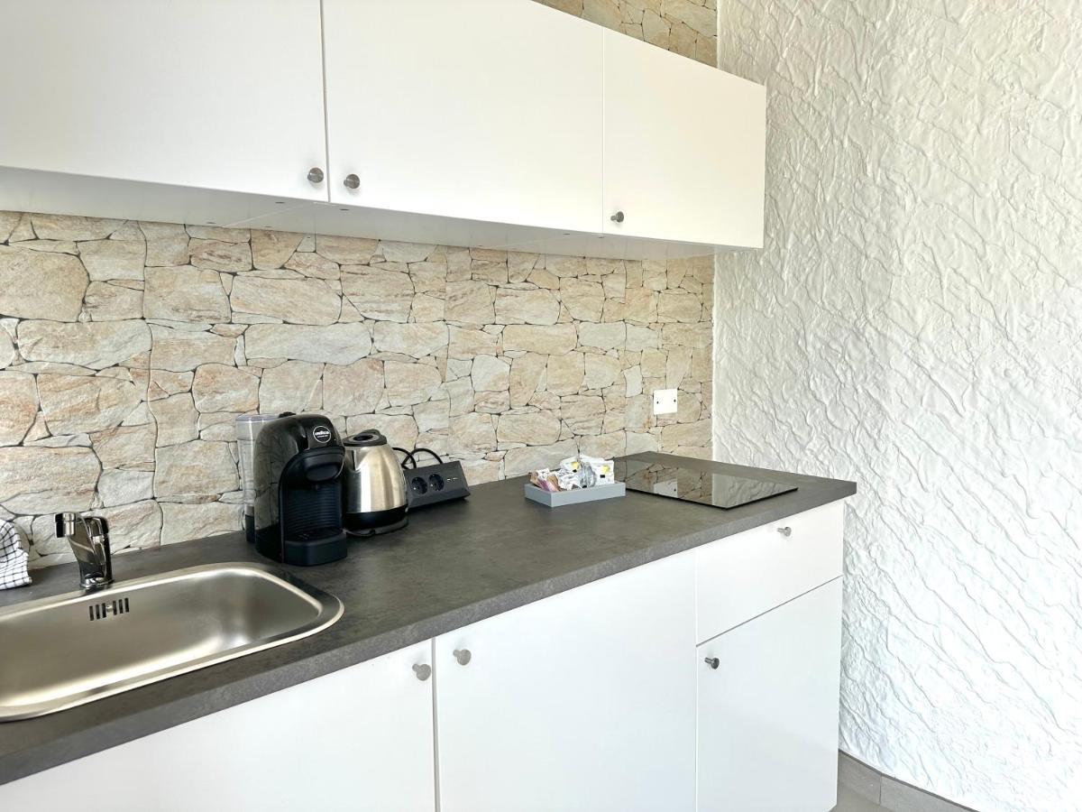 Abitatt Aparthotel Fosdinovo Bagian luar foto